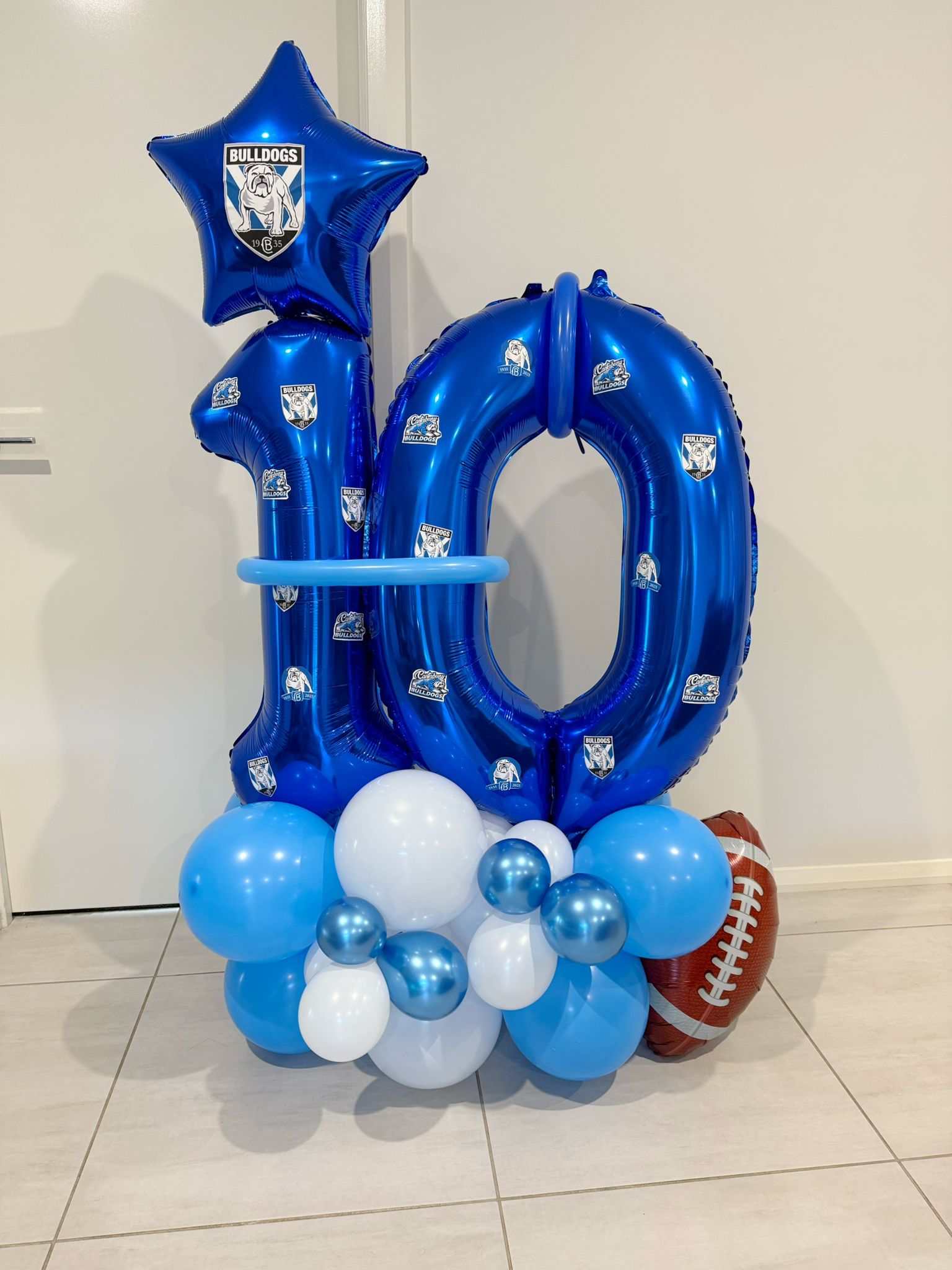 Custom balloon arrangement themed like NRL Bulldogs